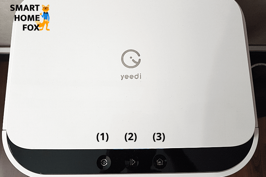 Die Steuerungsknöpfe an der Yeedi Mop Station in der Nahaufnahme